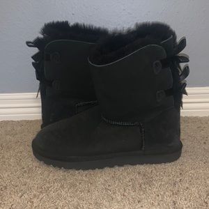 Black Uggs with bows on back